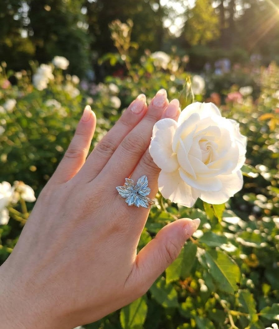 delicate blue and silver ring inspired by Boudin’s Fashionable Figures on the Beach, designed for sunny days, art lovers, and elegant evenings.