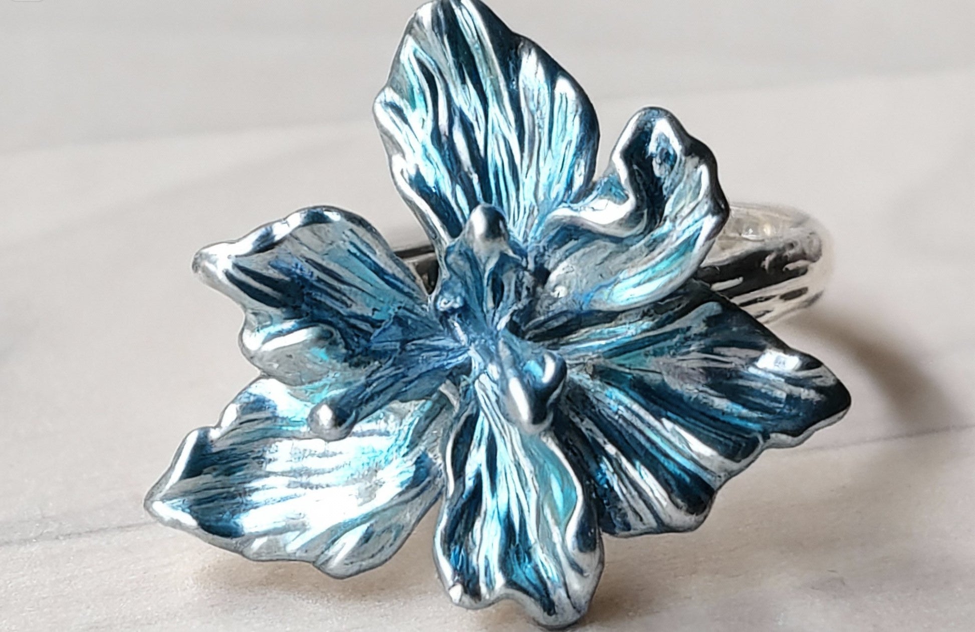 statement blue and silver ring inspired by Boudin’s Fashionable Figures on the Beach, ideal for art lovers, gallery visits, or evening occasions.