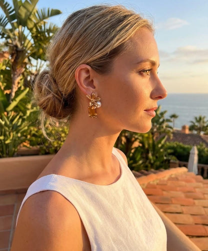 Delicate pearl earrings with brown and white flowers and glass accents, inspired by Diaz de la Peña, perfect for elevating work looks, client meetings, and daily wear.