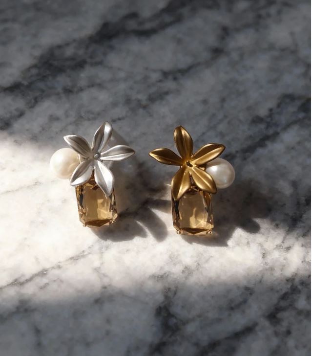 Nature-inspired pearl earrings capturing sunlight suitable for sophisticated daily outfits