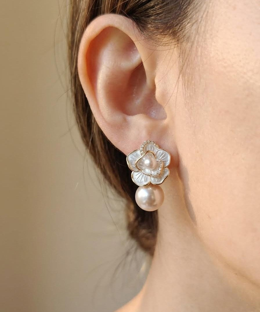 Art-inspired pearl earrings reflecting calm sunrise light and quiet renewal