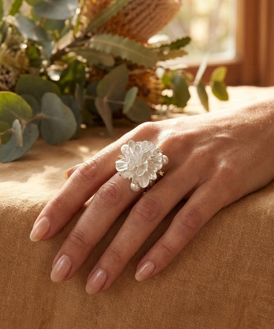 Art-inspired pearl ring reflecting Pissarro’s sunrise and soft winter light