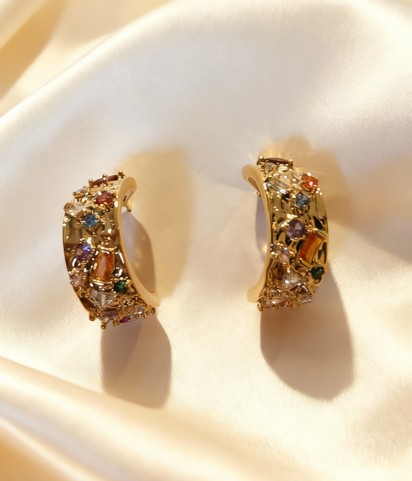 Colourful hoop earrings with colourful gemstones, perfect for professional women dressing up Fridays and weekend events.